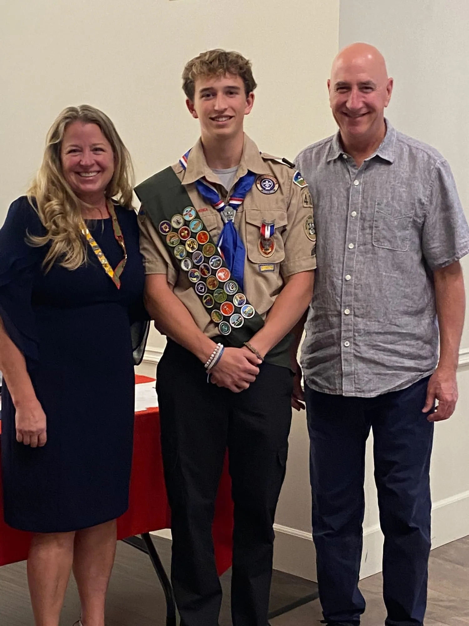 Me in my Scout uniform with my parents at my Eagle Scout ceremony