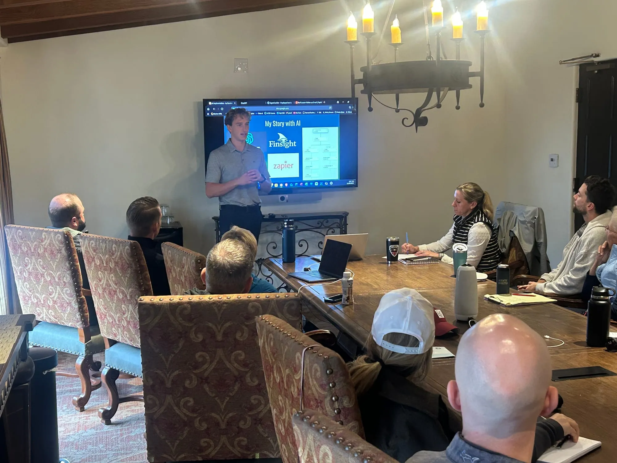 Roanin presenting "My Story with AI" to the La Cumbre Country Club team in a boardroom