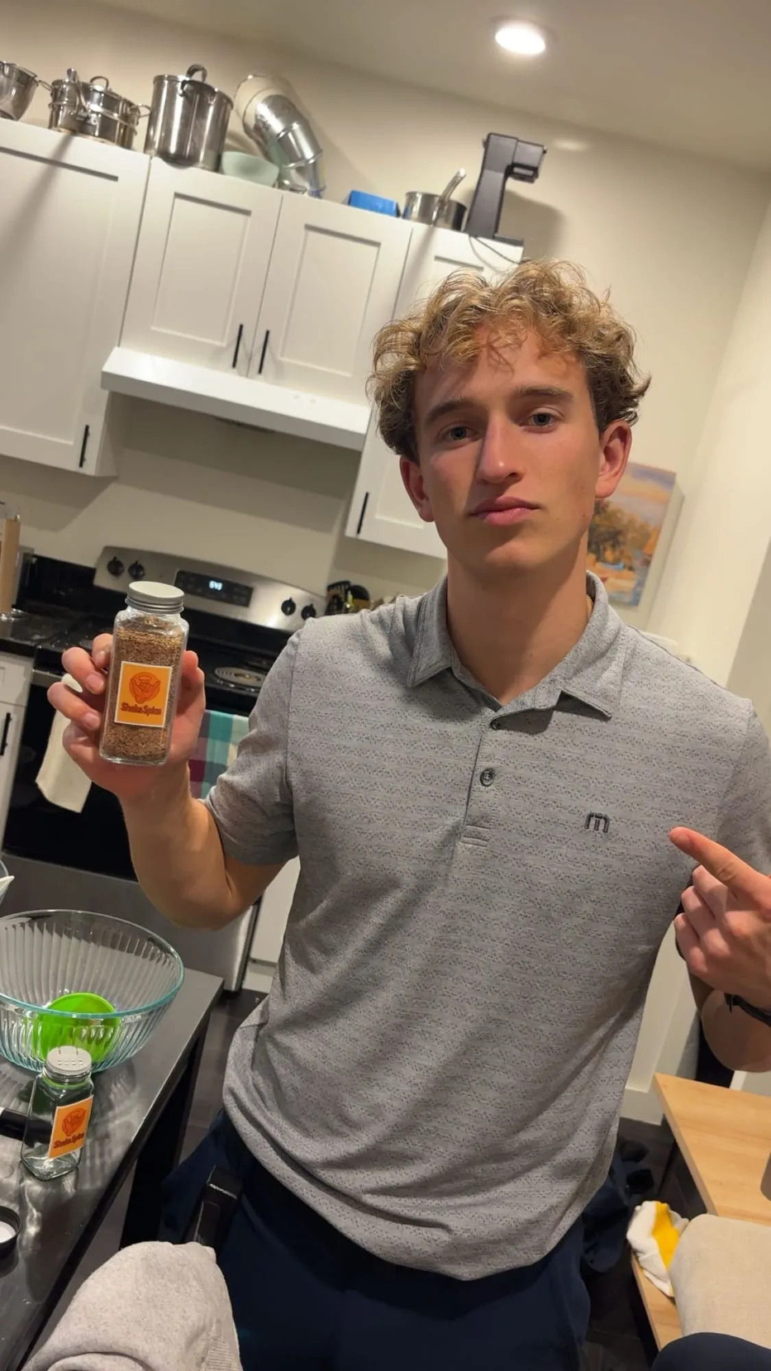 Holding a jar of Shaka Spice